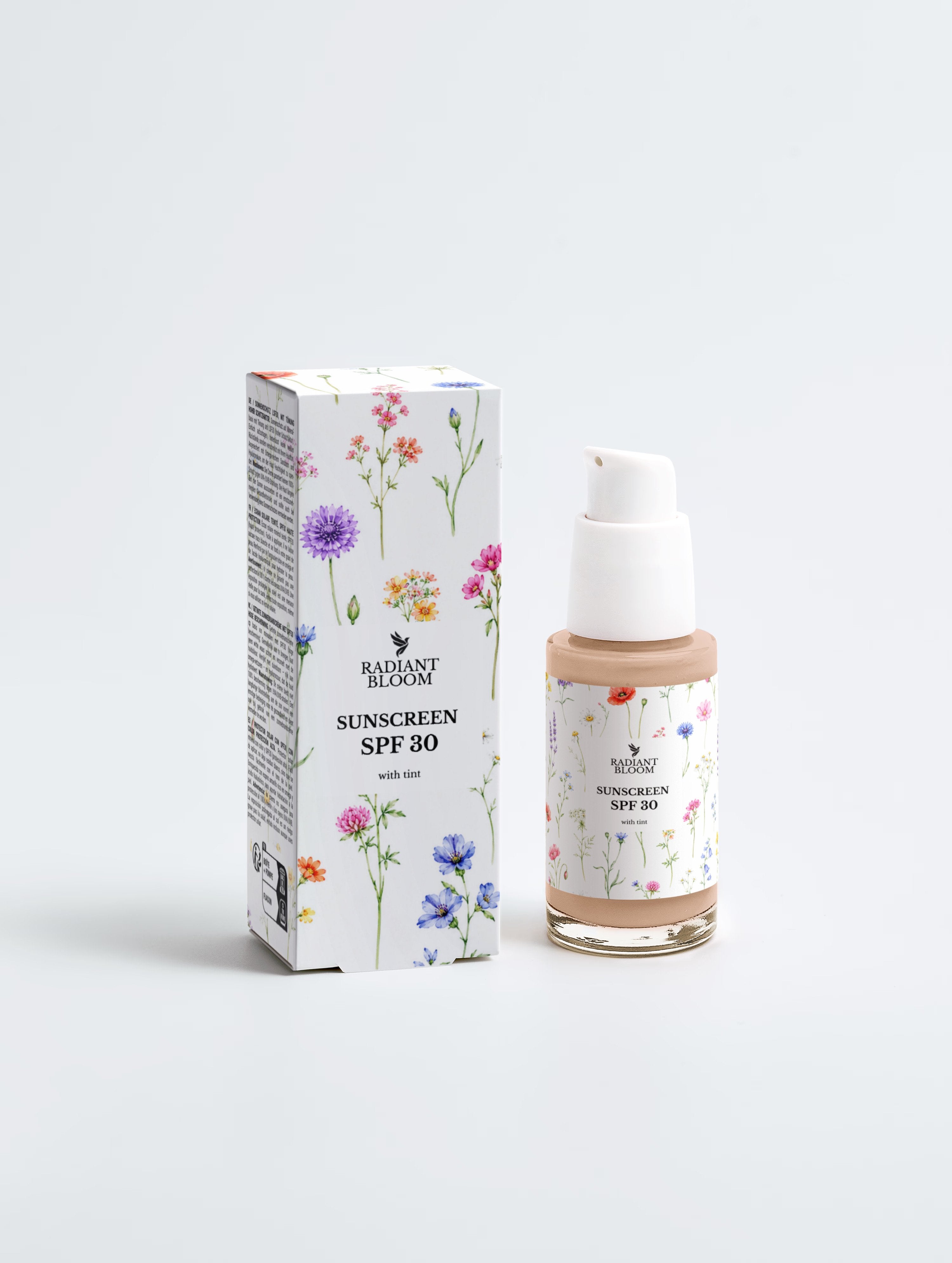 Tinted sunscreen SPF 30 pump bottle beside floral front carton.
