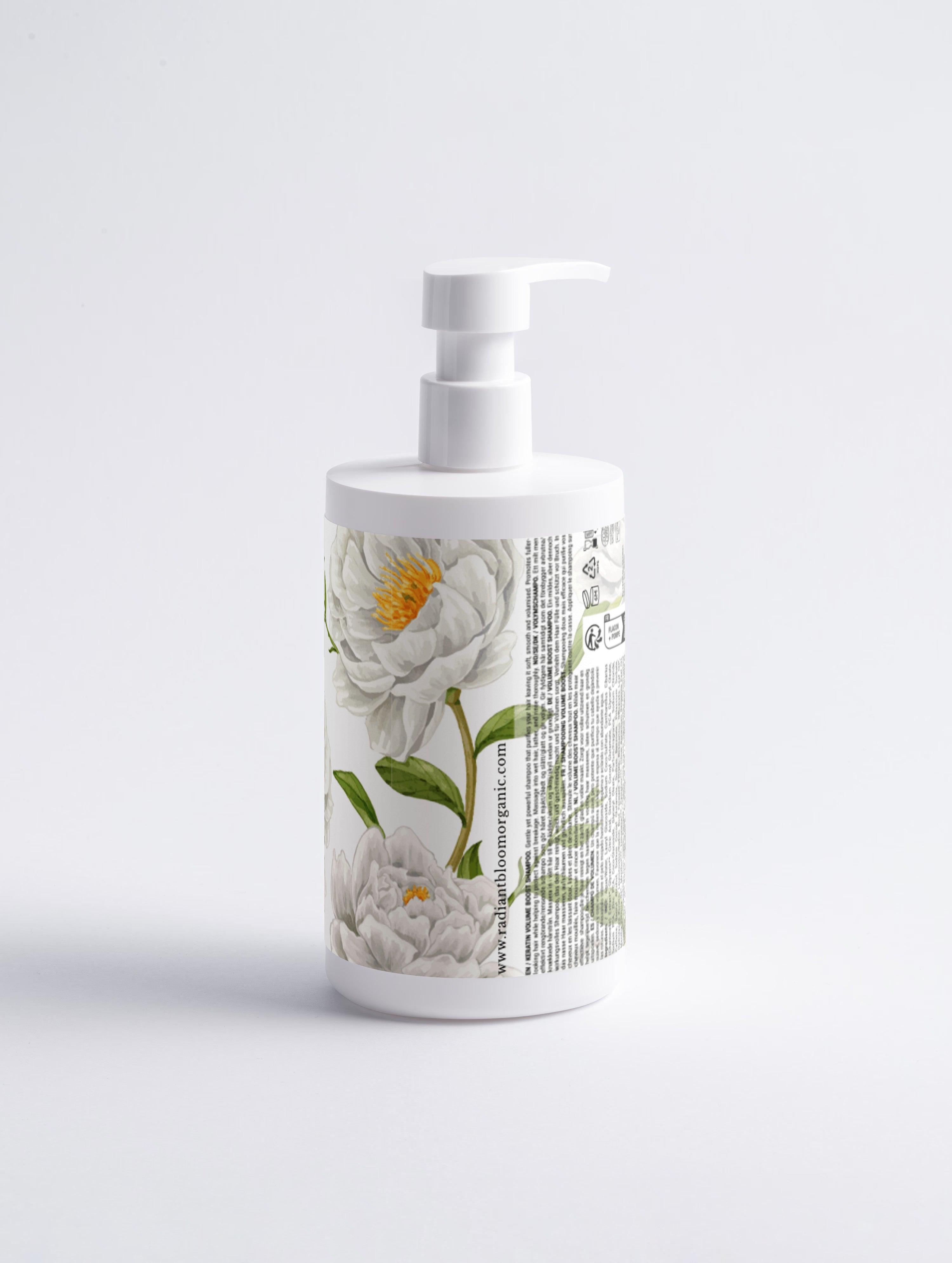 White shampoo bottle with pump and floral keratin rescue label on back, Radiant Bloom