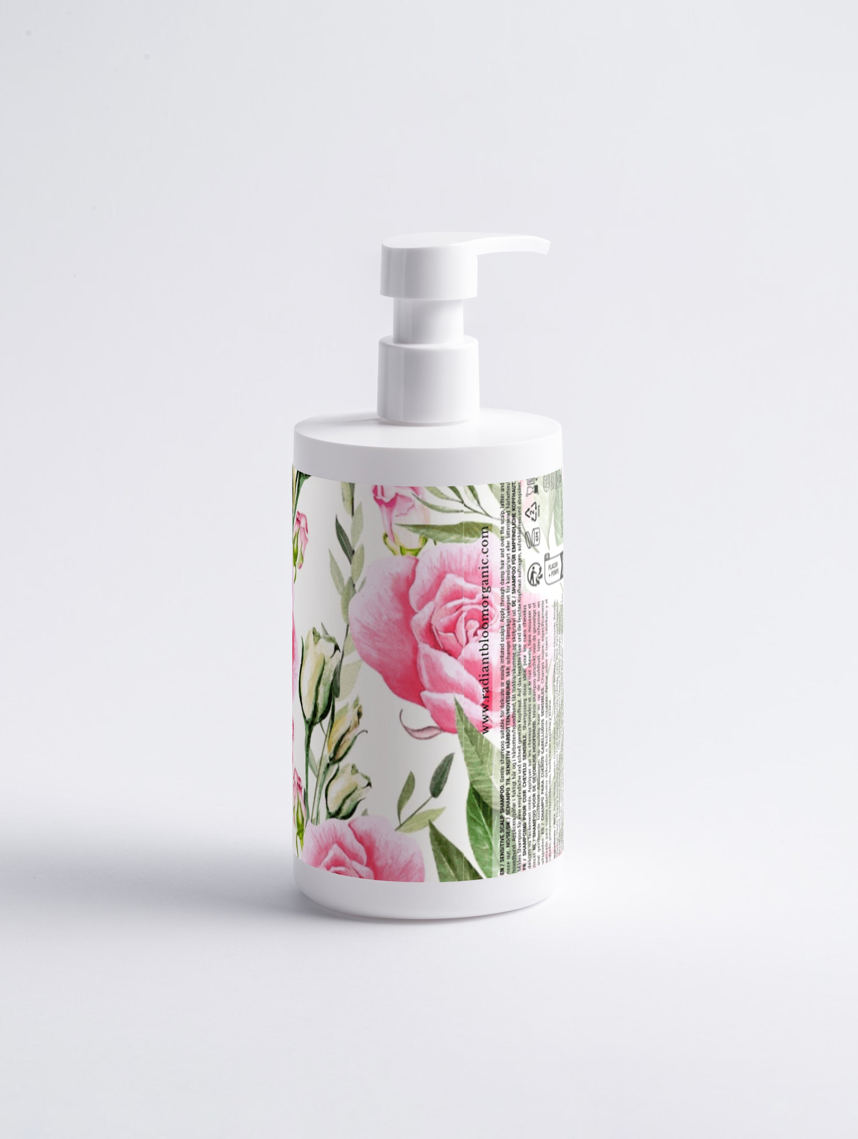 White bottle with floral design on a light gray background