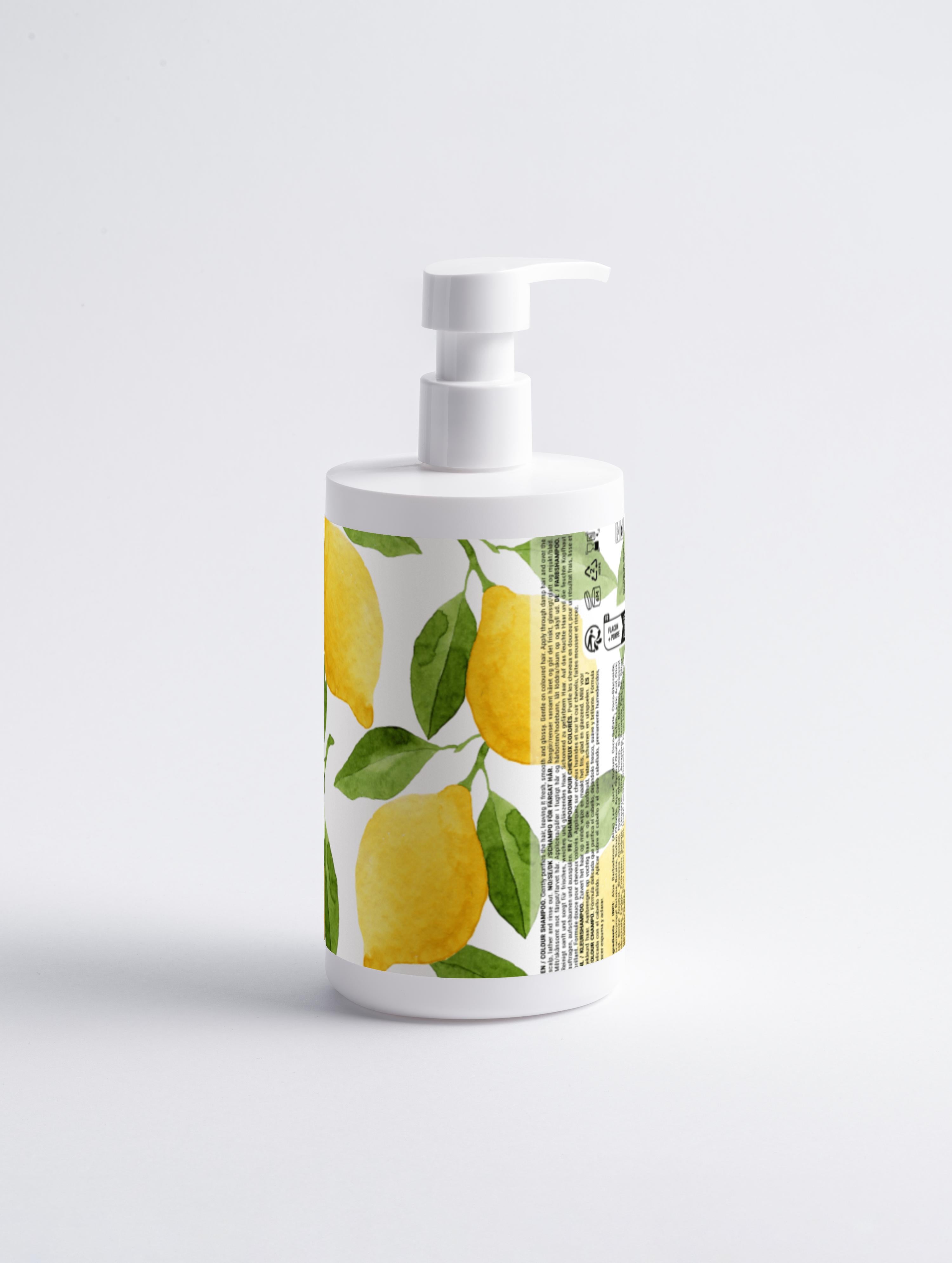 Color care shampoo bottle with pump; side/back view of citrus-labeled packaging